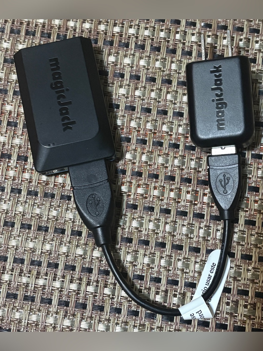 Magic magicJack VoIP Adapter with outlet wall plug charger.